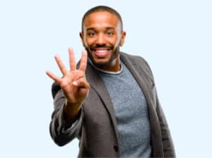 A black man making a v sign with his hand to support small businesses.